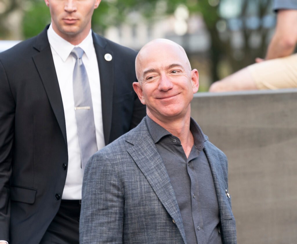 photo of Jeff Bezos smiling in a grey suit