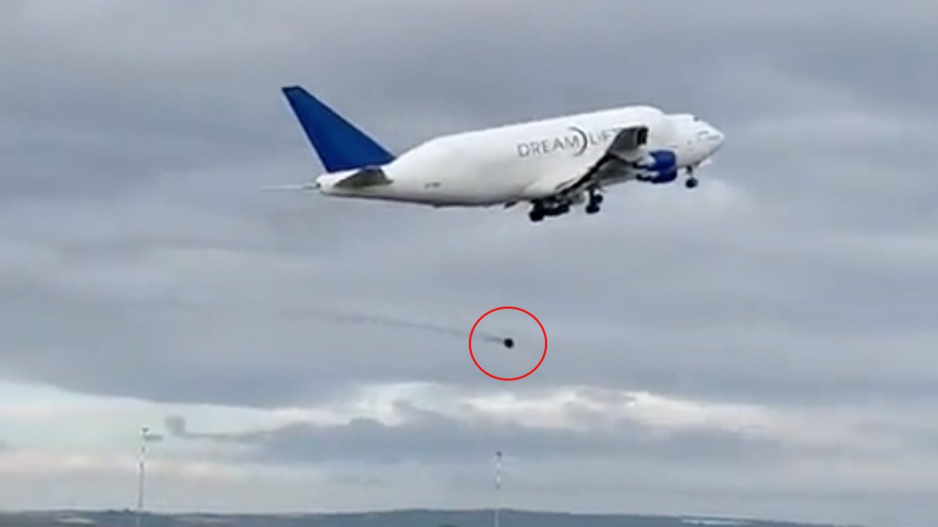 Incredible moment: Boeing 747’s smoking part hurls towards runway after takeoff.