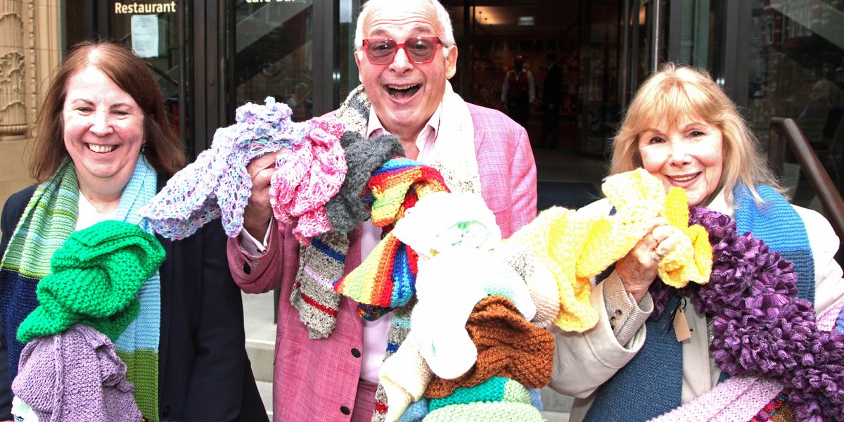 Christopher Biggins is among the stars that wrapped Royal Albert Hall in a mile-long scarf