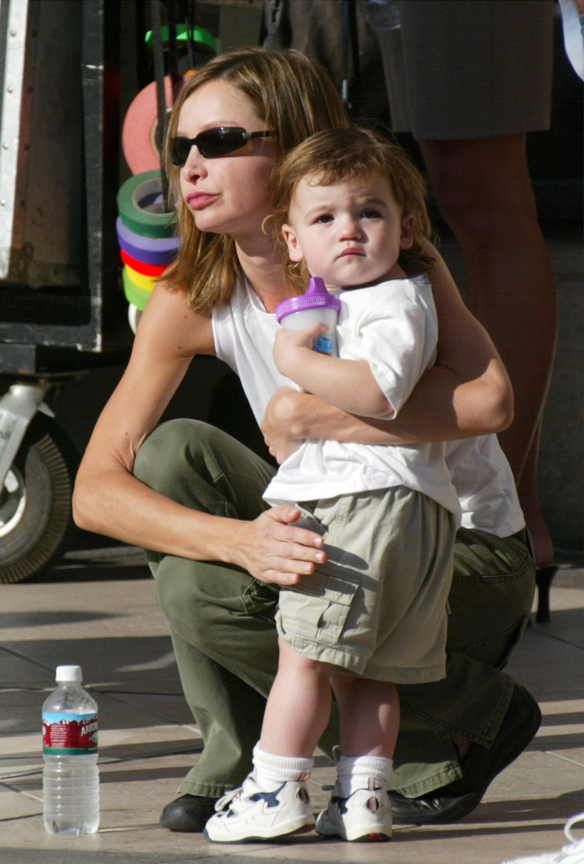 Calista Flockhart and her son, Liam, on the set of Harrison Ford's upcoming movie, "Two Cops" on September 17, 2002, in Beverly Hills, California | Source: Getty Images