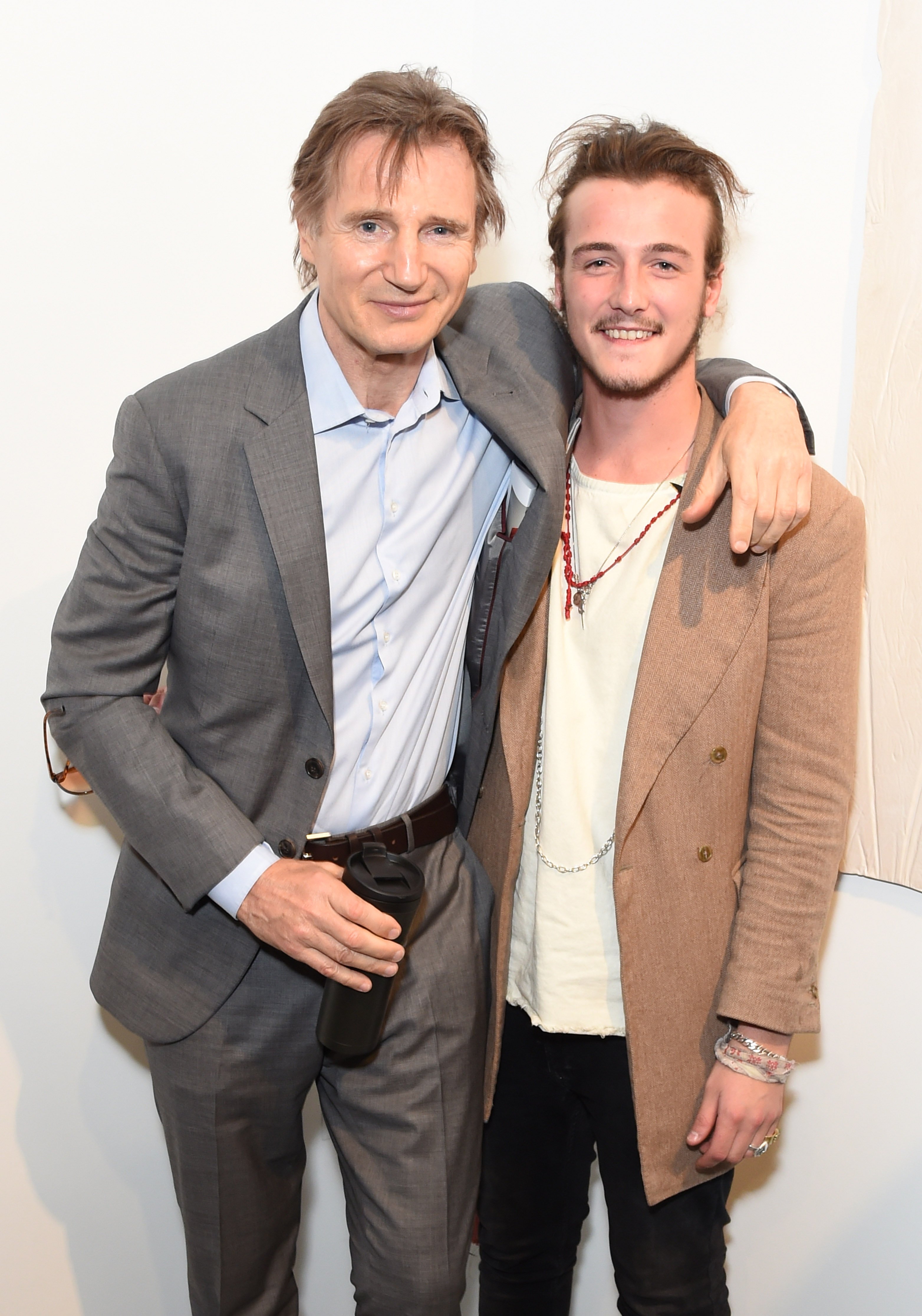Liam Neeson (L ) and Michael Neeson at the Maison Mais Non launch party as Micheal Neeson launches fashion gallery in Soho on June 2, 2015. | Source: Getty Images