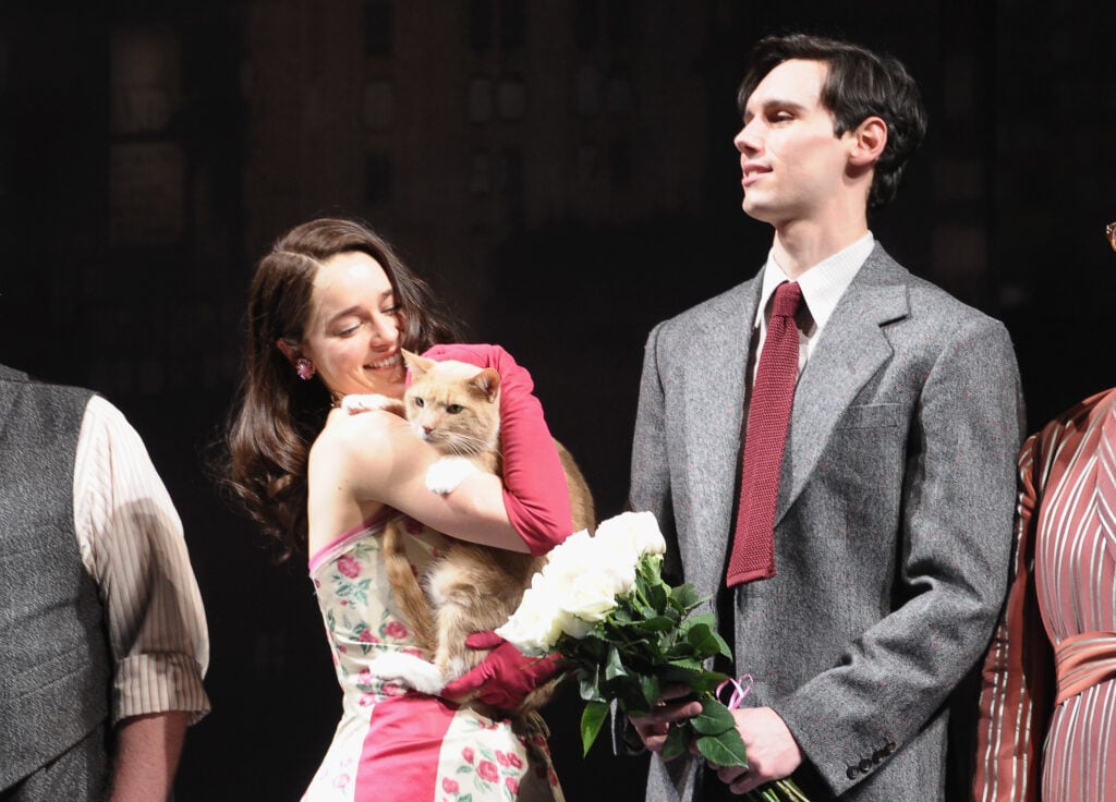 Actors/cast members Emilia Clarke and Cory Michael Smith and Vito Vincent the cat take part in the "Breakfast At Tiffany