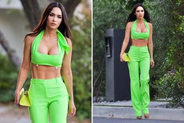 Megan Fox stuns in green crop top and trousers before Machine Gun Kelly concert