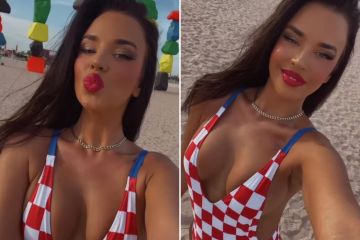 ‘World Cup’s hottest fan’ pouts & struts down Qatar beach in swimsuit