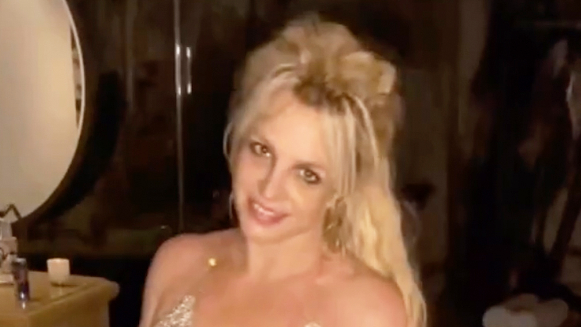 Britney Spears’ side boob pops out of her tight minidress as pop star shows off raunchy dance moves in NSFW new video