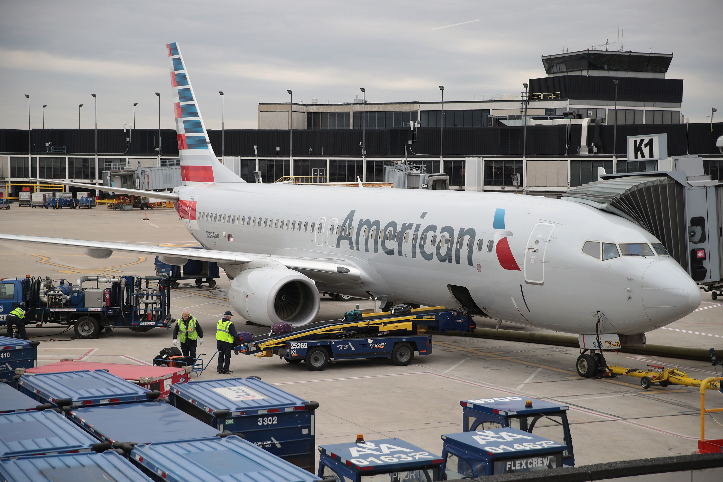 Some travelers say they would've rather seen American Airlines' new baggage fee added to the ticket price, instead of at checkout