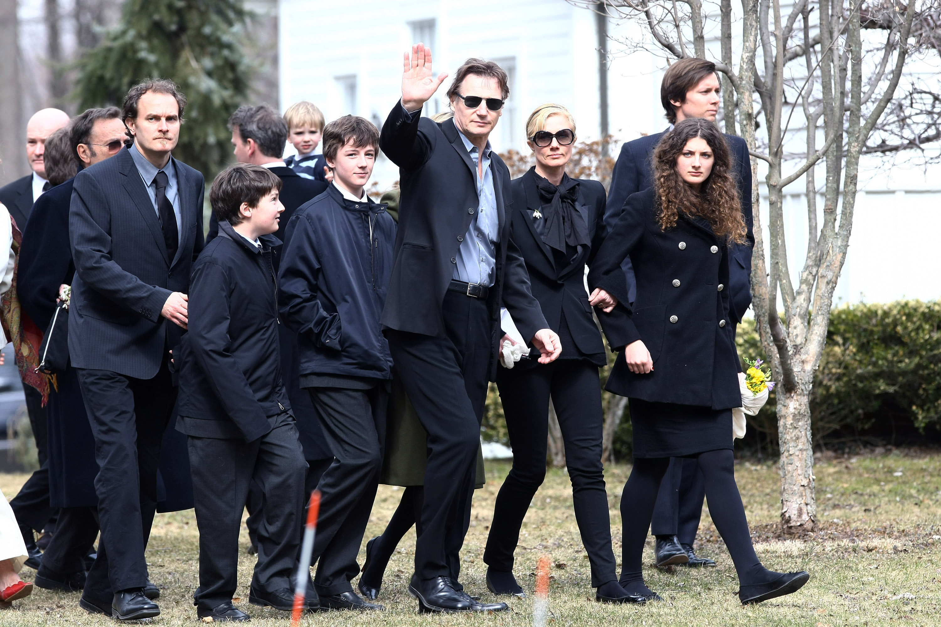 Liam Neeson with his sons Micheal and Daniel and the rest of his family at Natasha Richardson's funeral in New York in 2009 | Source: Getty Images