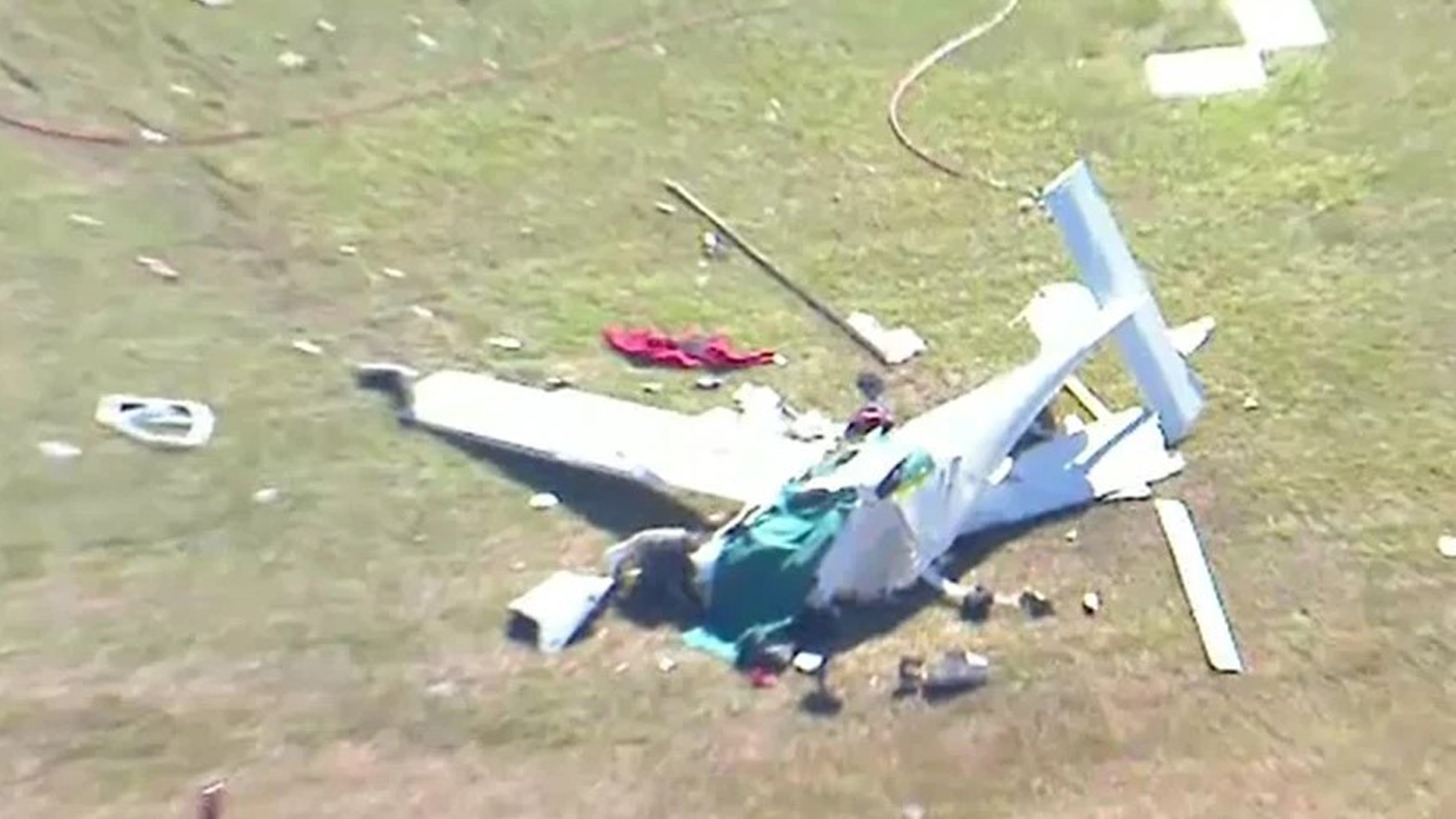 In a mid-air horror collision, two planes crash into each other and kill a woman and man in Brisbane