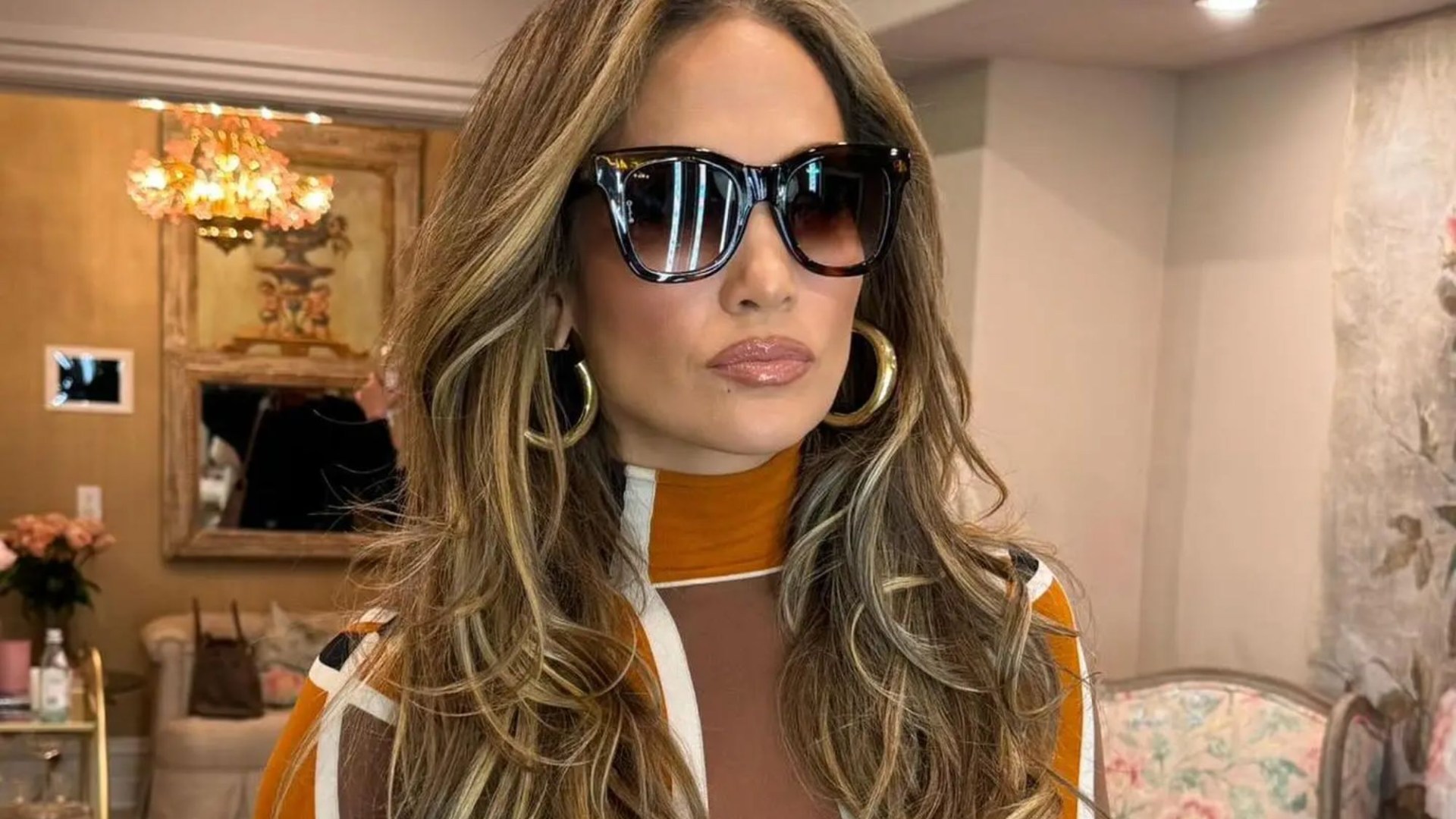 “Jennifer Lopez Stuns in 60s-Inspired Matching Set at Boozy Brunch for Her Cocktail Brand” – Luxury Fashion and Celebrity Lifestyle at Its Finest With JLo at 54!