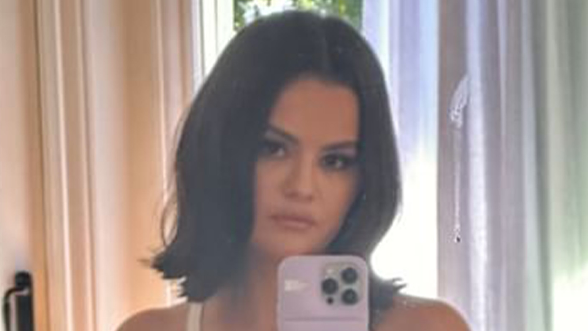 Selena Gomez stuns in curve-hugging jeans and tank top, embracing body positivity