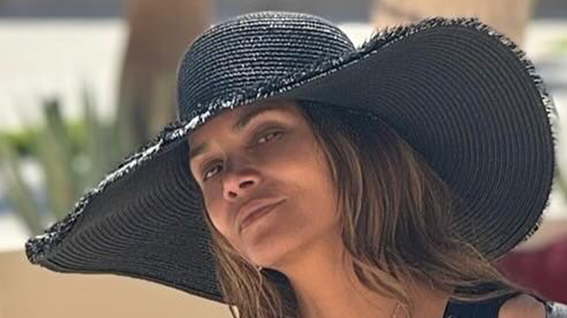 Halle Berry, 57, stuns fans in plunging black swimsuit on Cabo vacation – timeless beauty at its finest!