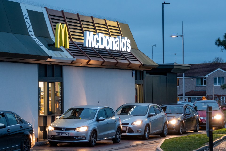 Cars queue at McDonald's drive-thru