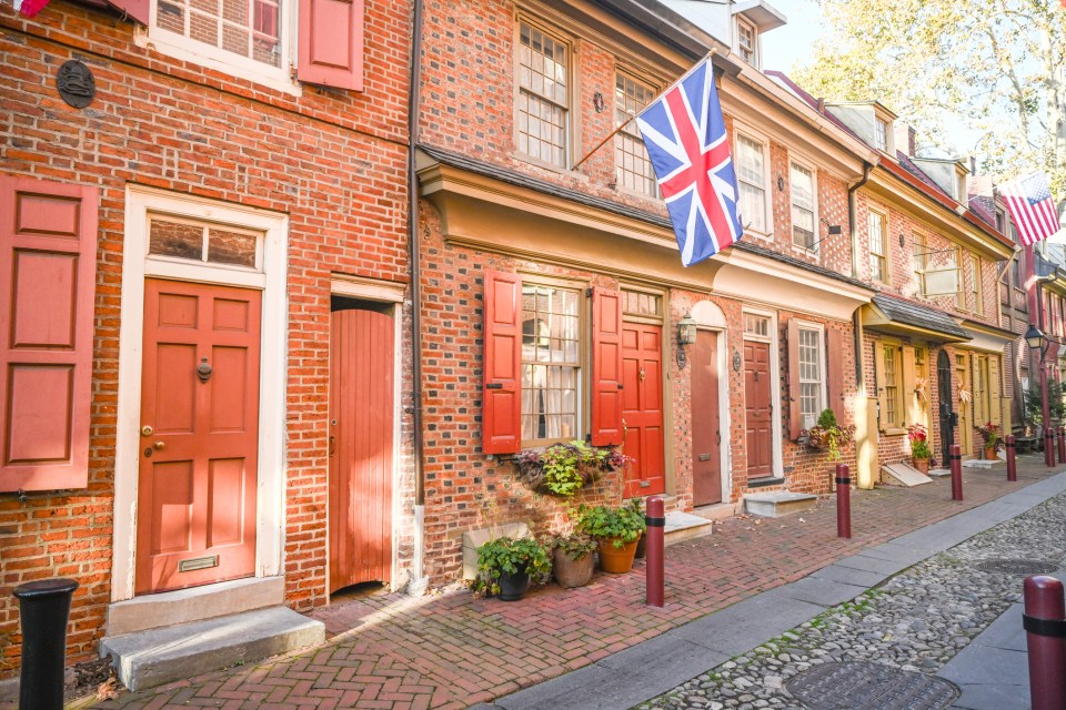 Elfreth’s Alley in Philadelphia with a British flag