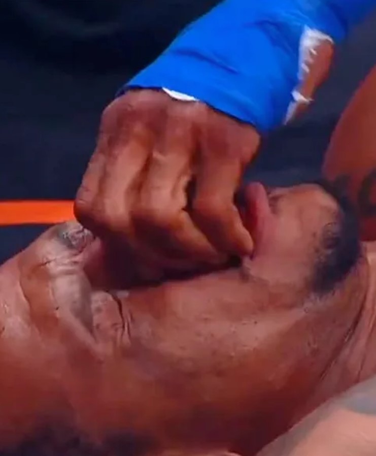 'Cowboy' seemingly tried to realign his nose after being sent hurtling to the canvas